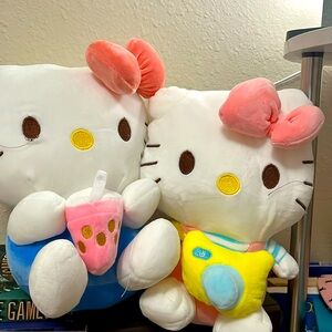 2 cute boba and photographer hello kitty plush! Super cute and soft